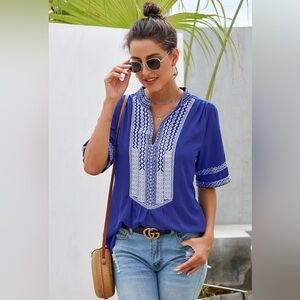 Un Branded Women’s royal blue blouse with detailed White embroidered trim size S